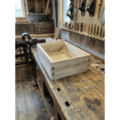 Beekeeping Equipment honey super ideal 8 frame on a workbench